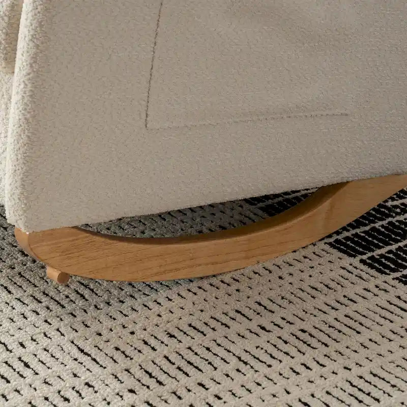 Fauteuil à bascule rembourré à dossier haut avec repose-pieds et pieds en bois