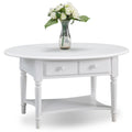 Table basse ovale avec étagère et tiroirs
