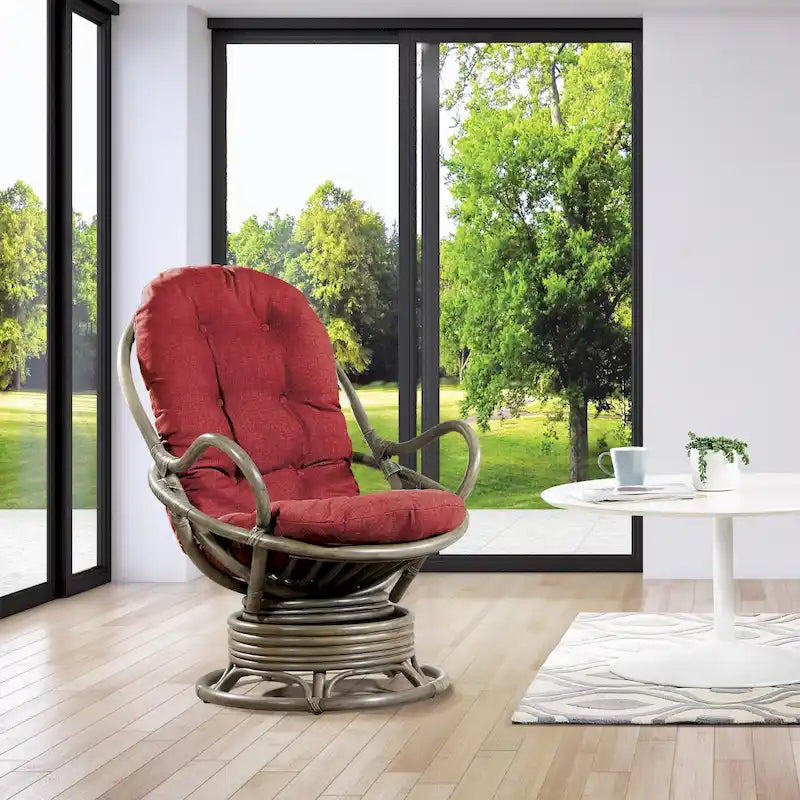 Fauteuil à bascule pivotant en rotin tressé avec coussin