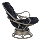 Fauteuil à bascule pivotant en rotin tressé avec coussin
