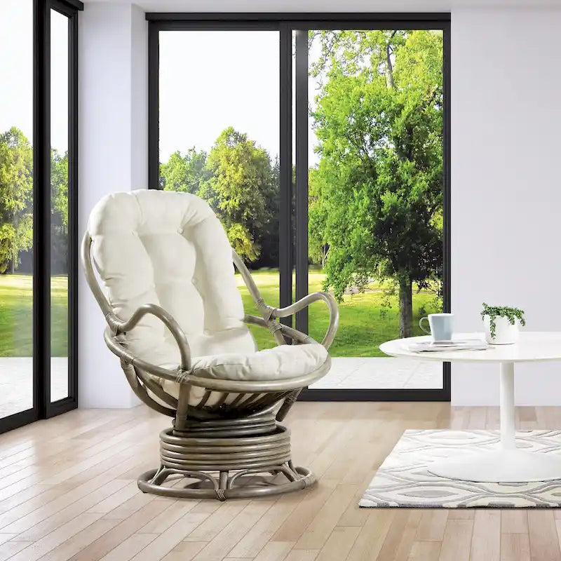 Fauteuil à bascule pivotant en rotin tressé avec coussin