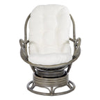 Fauteuil à bascule pivotant en rotin tressé avec coussin