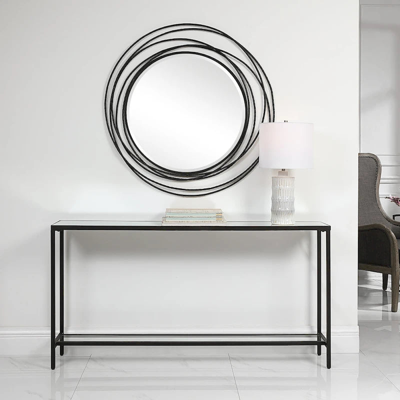 Console étroite, acier noir mat, dessus en miroir biseauté, étagère en verre
