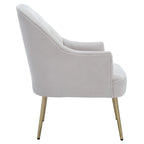 Fauteuil d'appoint en velours capitonné avec pieds en métal doré